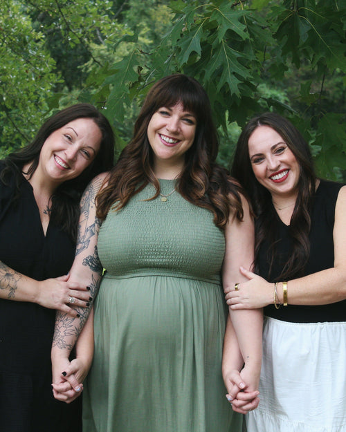 Three women standing together with our comfortable everyday bras.