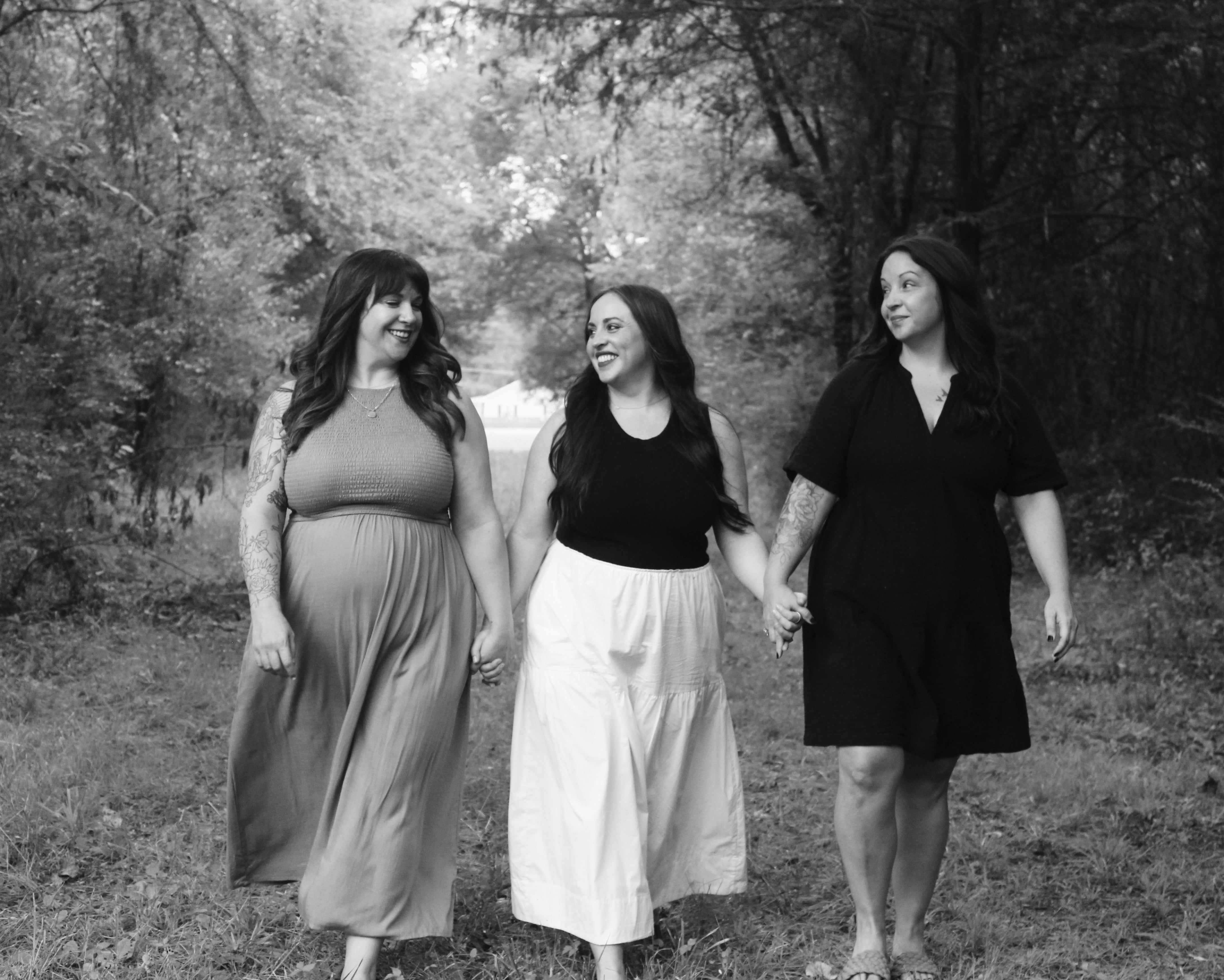Three women walking together wearing everyday comfortable bras for petite frames and full bust. 